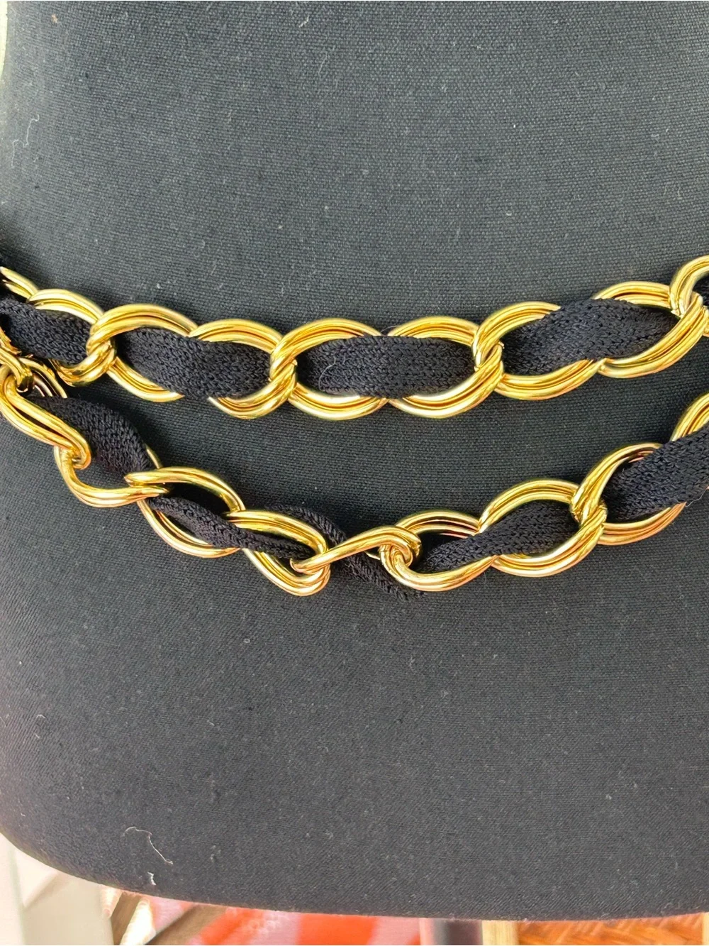 Couture style chunky gold tone and black textile woven chain belt